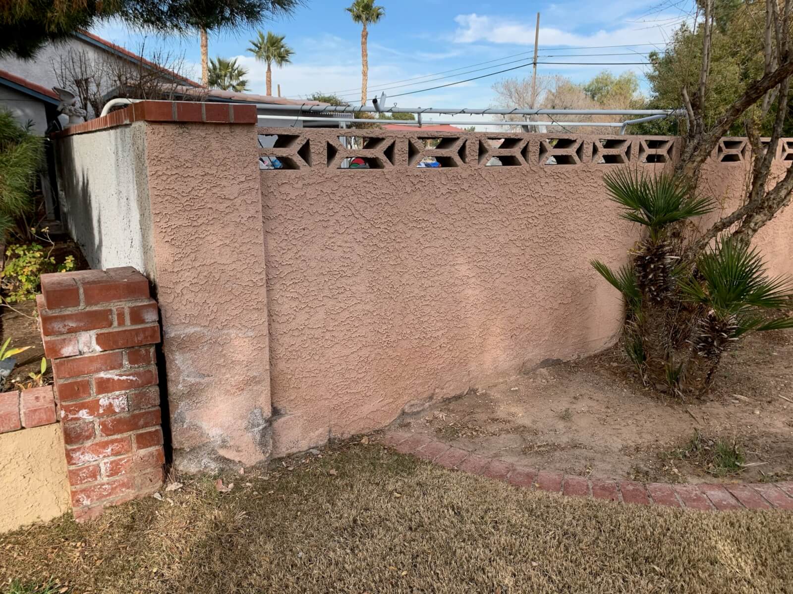 Stucco wall repair and paint before