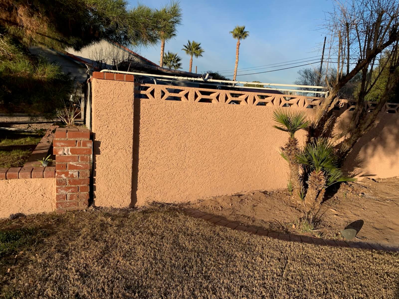 Stucco wall repair and paint after