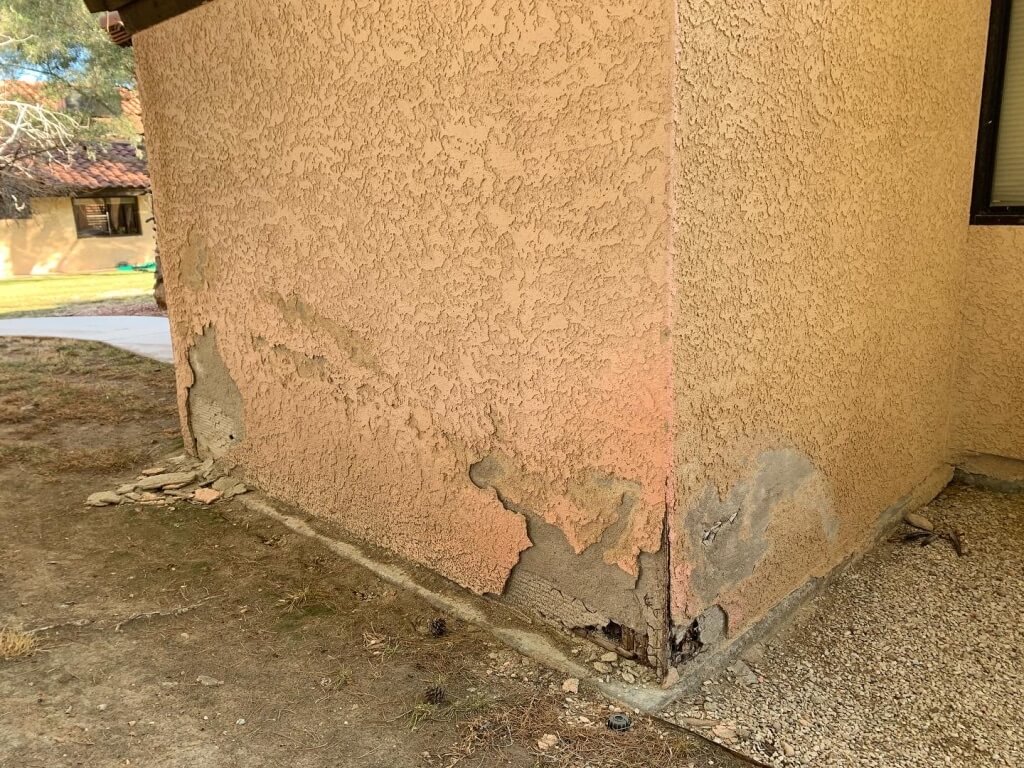 Stucco Damage Side of Casita